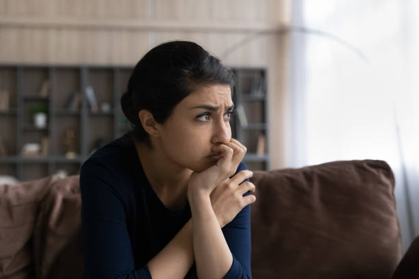 istock Thoughtful young Indian ethnic woman suffering from problems. 1442639244