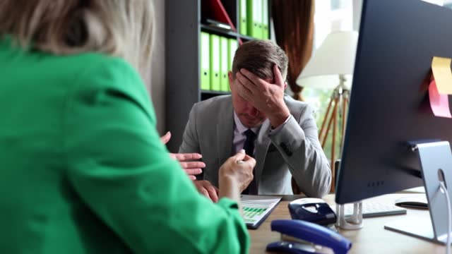 Boss feels frustrated, stressed and depressed due to financial report read team leader