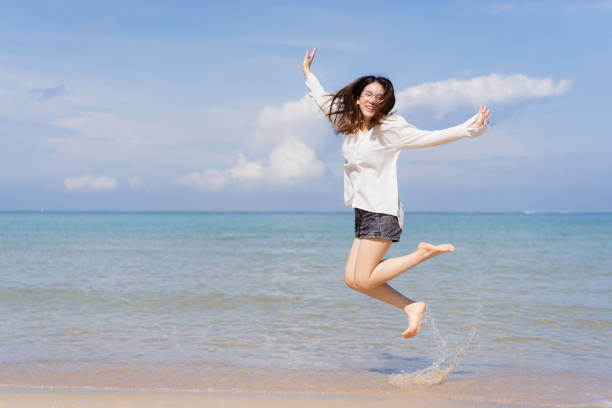 istock Pretty girl walking at the beach. 1442653235