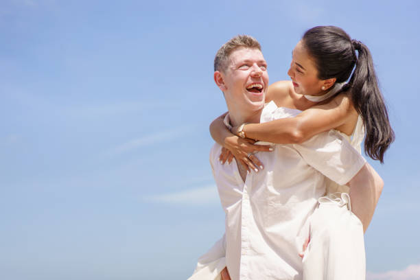 istock Young couple at the beach. 1442654176