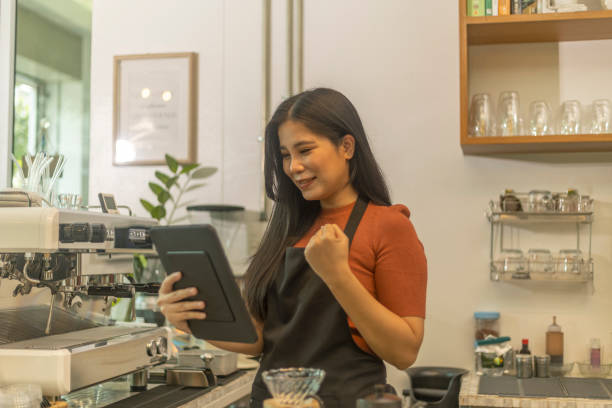 istock Young female coffee shop owner with her services 1442662767