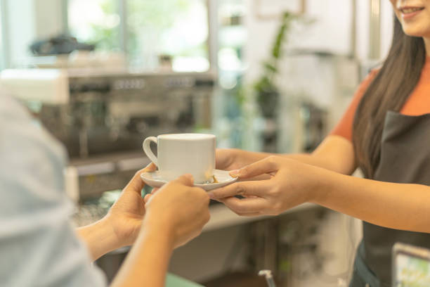 istock Young female coffee shop owner with her services 1442662803