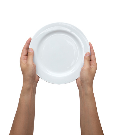 Male hands are holding a plate on a white isolated background