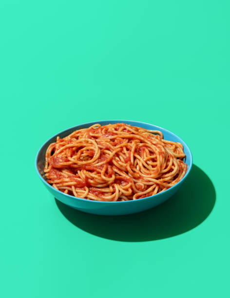 istock Spaghetti Pomodoro dish isolated on a green background 1442668266