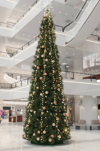 istock Christmas Tree With Gold Colored Ornaments In Shopping Mall 1442677273