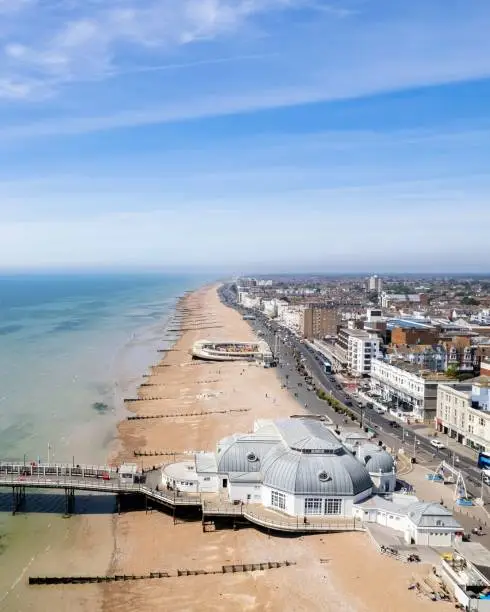 Aerial photography of the British seaside town of Worthing, Worthing Pier, and Worthing beach
