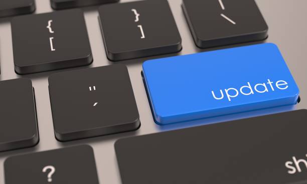 istock Closeup shot of a laptop keyboard with a blue update  button 1442678600