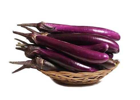 Basket of Asian Purple Eggplants Isolated on White Background