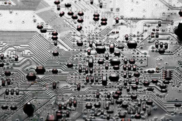 istock Close up of components and microchips on PC circuit board 1442679315