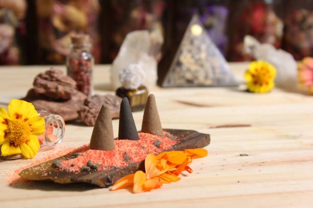 istock Incense Cones on Stone Slab With Crystals and Flowers 1442679686