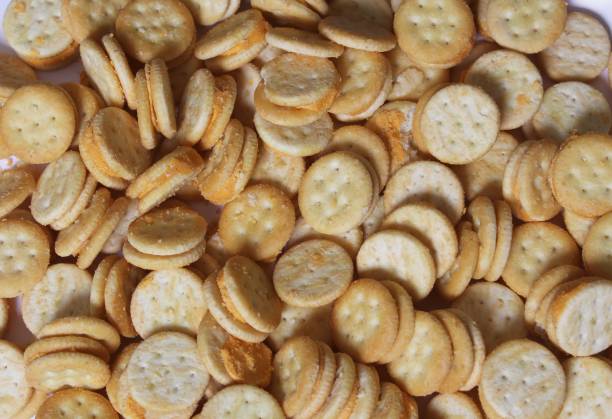 istock Pile of Cheese Snack Crackers Close up 1442679810