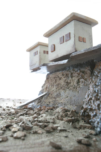 Collapse of house due to landslide stock photo