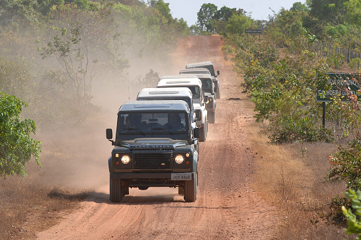 Jalapao, Brazil – September 29, 2008: A convoy of Land Rover Defender model cars traveling on the dirt roads of the Jalapao National Park, Tocantins, Brazil