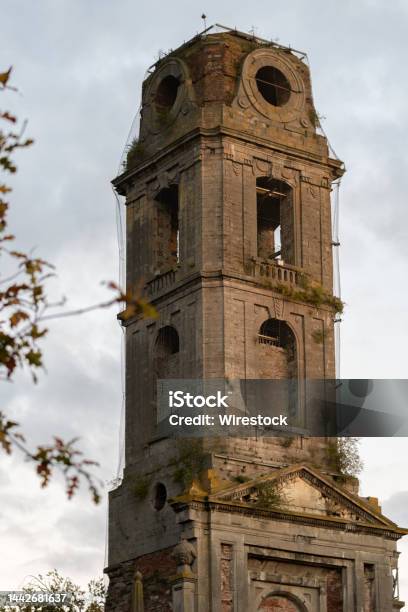 Vertical Shot Of Abbey Tower At Pairi Daisa Zoo Park In Belgium Stock Photo - Download Image Now