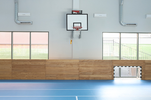 This is a basketball court inside.