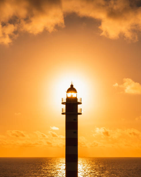 istock Beautiful shot of a lighthouse during the sunset 1442685414