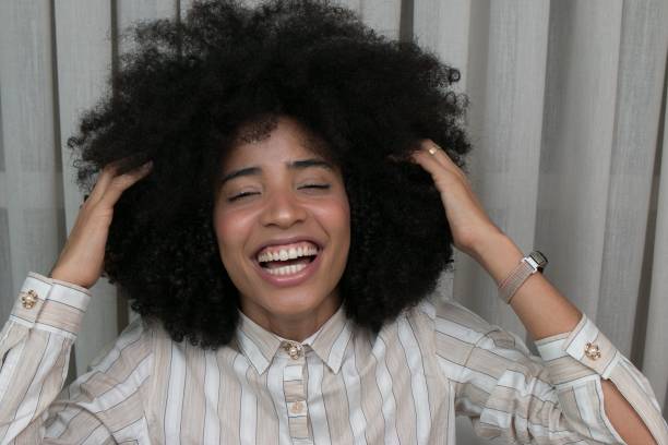 istock Happy young woman with big smile 1442685895