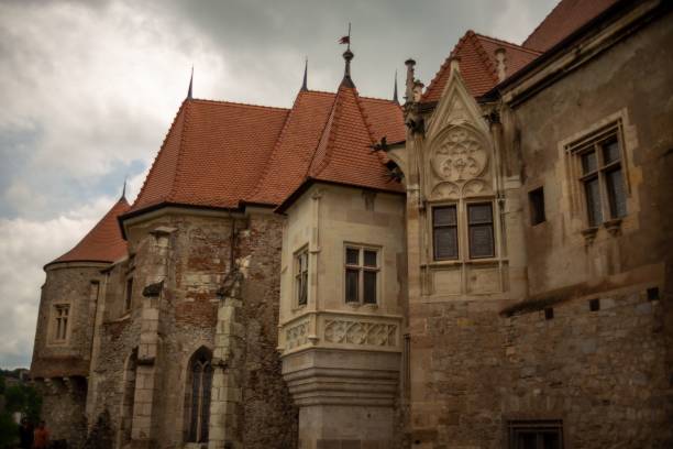 istock Low-angle view of ancient buildings on a cloudy day 1442688936