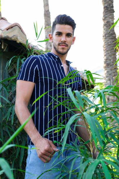 istock Handsome Spanish gardener is posing outdoors 1442689663