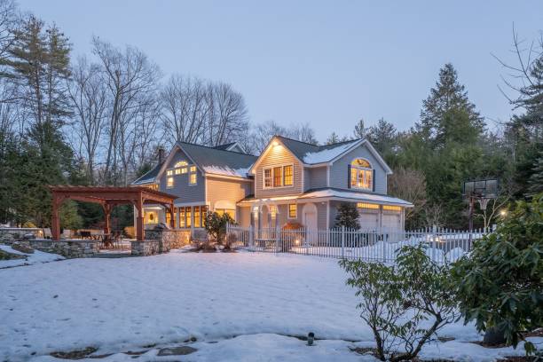 istock Beautiful modern house surrounded by nature in winter 1442689876