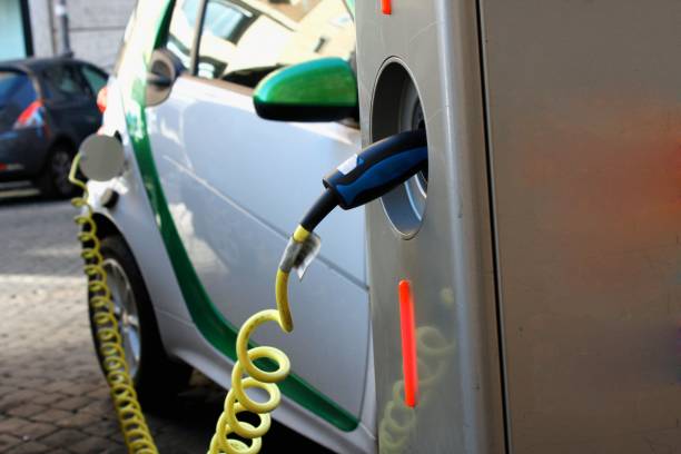 istock Charging an electric car with the power cable supply plugged in. 1442690802