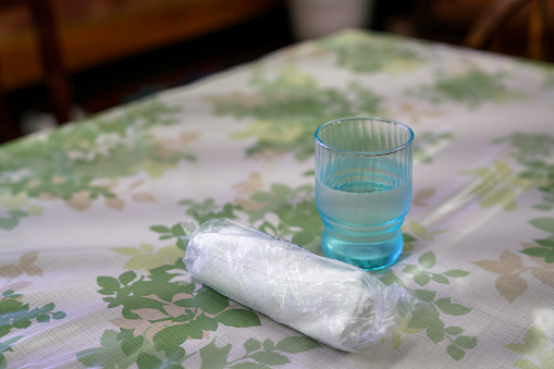Cold water and hand towel on the table
