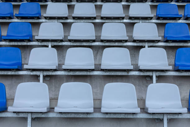 istock Closeup of the white and blue plastic stadium seats 1442693329