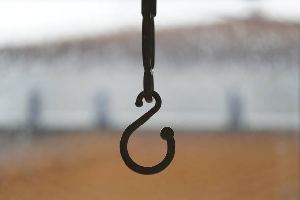 A closeup shot of a hanging hook on a blurred background