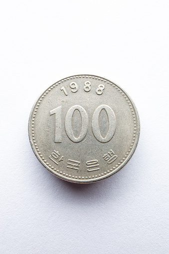 Coin on white. Soft Lighting with Soft Shadow.