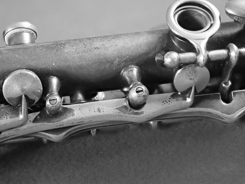 old clarinet details with grey background