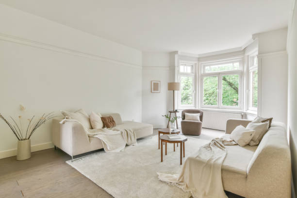 istock Spacious living room with comfortable sofas and other modern elements of interior 1442696163