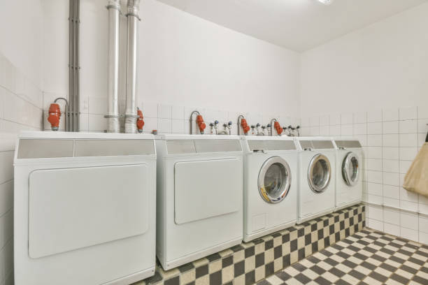 istock Retro laundromat interior with a checkered floor 1442696279