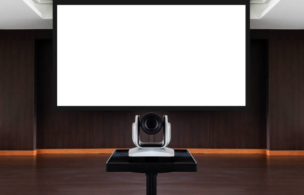 istock Web camera for online meeting with white projector screen background in meeting room 1442697364