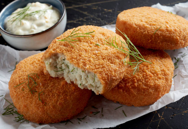 istock Closeup of delicious haddock fishcake on a table 1442697431