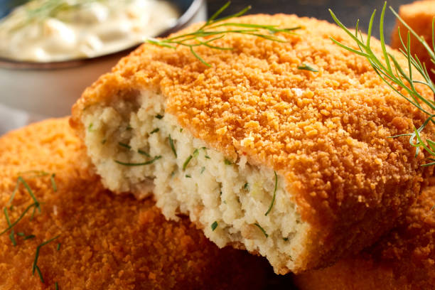 istock Closeup of delicious haddock fishcake on a table 1442697440