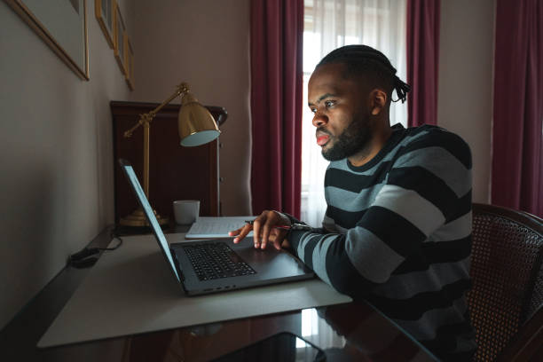 istock African American Male Employee Working From Home 1442698324