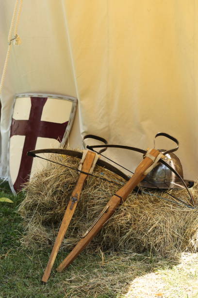 istock Vertical closeup of the medieval crossbows with a shield. 1442698657