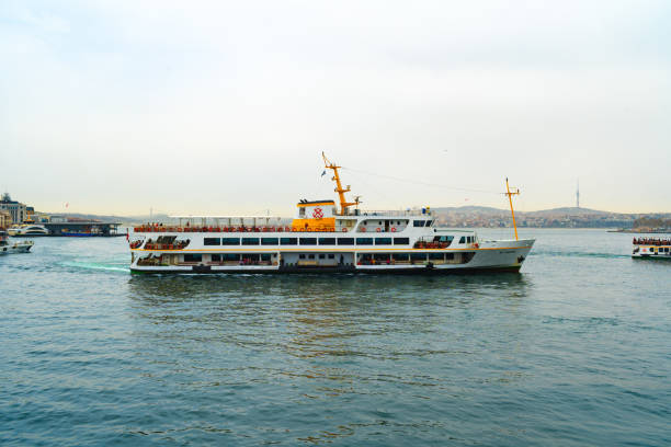 ISTANBUL, TURKEY - APRIL 1, 2022 : Public transportation ferry ship in Istanbul city