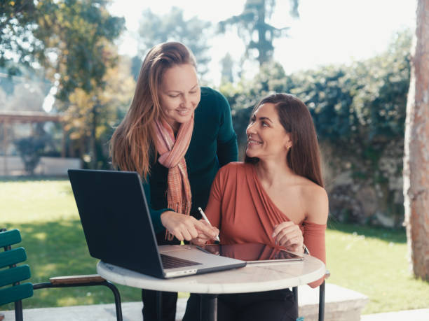 istock Entrepreneur Women Having A Discussion On Their Business Using Laptop Computer And Digital Tablet 1442716782