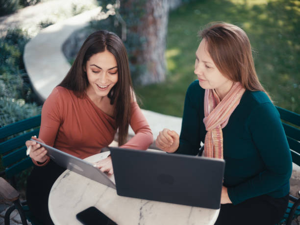 istock Entrepreneur Women Having A Discussion On Their Business Using Laptop Computer And Digital Tablet 1442716937