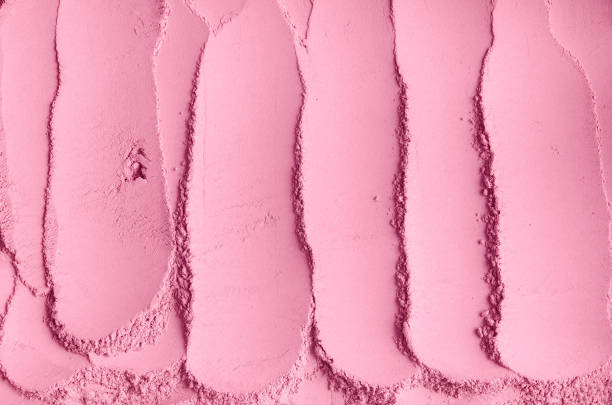 istock Pale pink cosmetic clay powder (alginate modeling facial mask, eye shadow, blush, body wrap) texture close-up, selective focus. Abstract background with brush strokes. 1442717432
