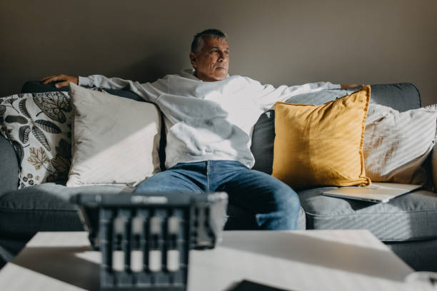 istock Senior man on the couch chilling 1442720308
