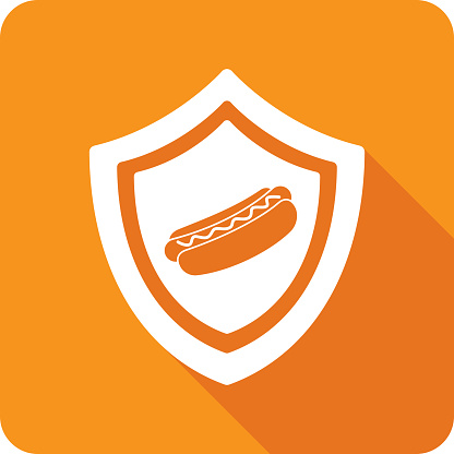 Vector illustration of a shield with hotdog icon against an orange background in flat style.