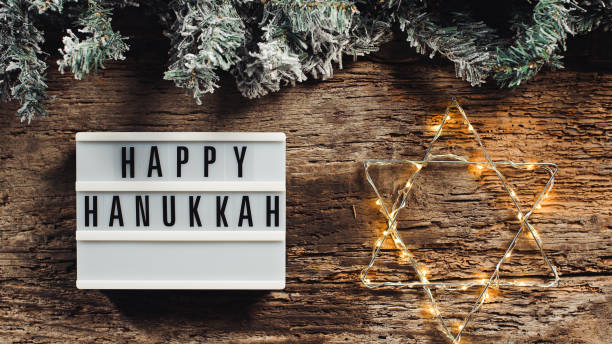 istock Happy Hanukkah signboard and David star 1442721280