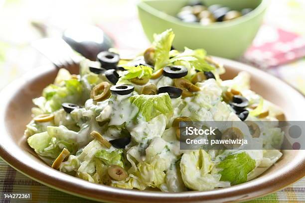 Salad With Olives And Celery Stock Photo - Download Image Now - Arranging, Celery, Crockery