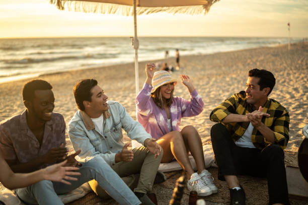 istock Friends having a party at the beach 1442723804