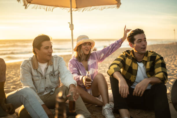 istock Friends having a party at the beach 1442726613