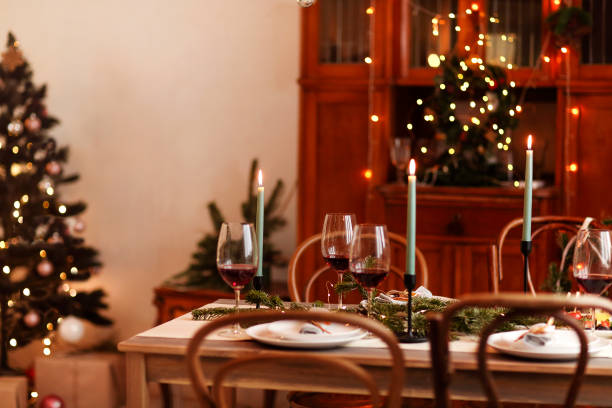 istock Candles and wine on Christmas table 1442726695