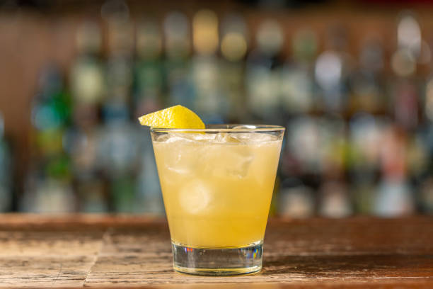 istock Penicillin cocktail on the bar. Blurred background.Summer refreshing drink, side view 1442727918