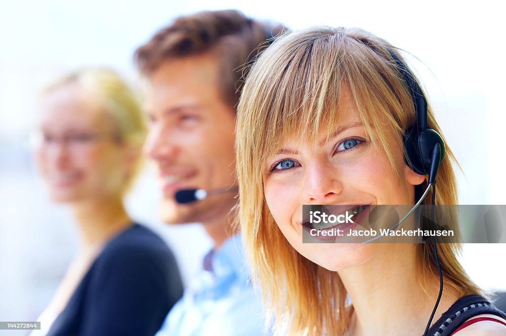 How can I help you? Portrait of an attractive young telesales assistant Adult Stock Photo